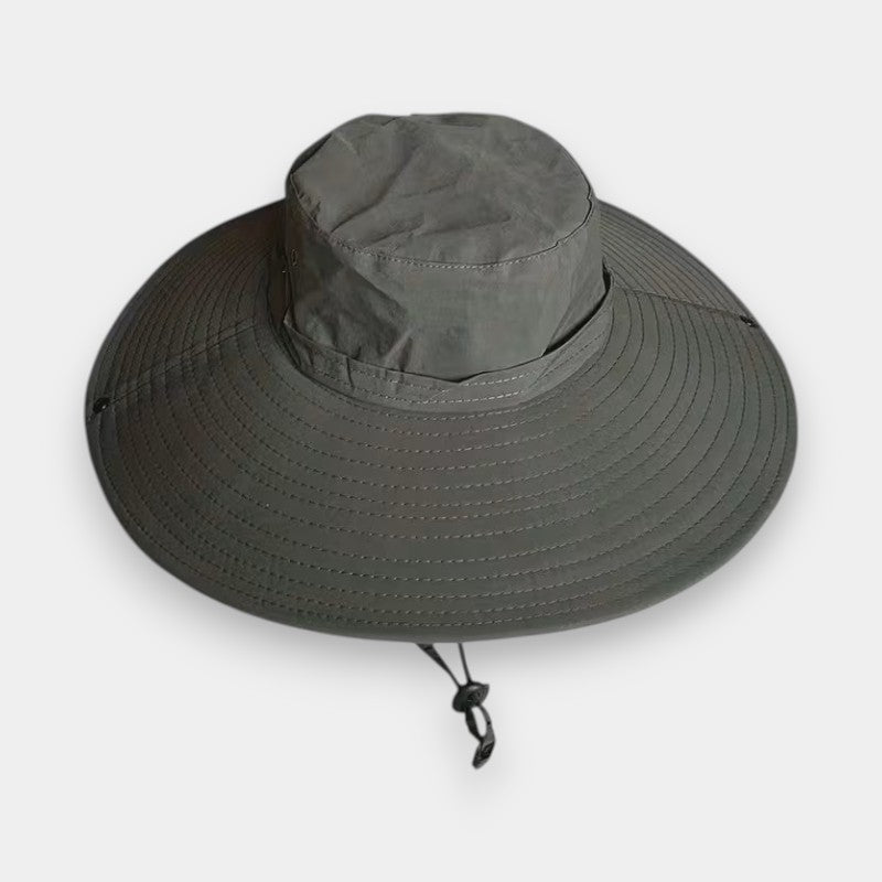 Gray wide brimmed hat with a drawstring on a white background