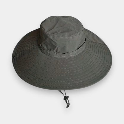 Gray wide brimmed hat with a drawstring on a white background