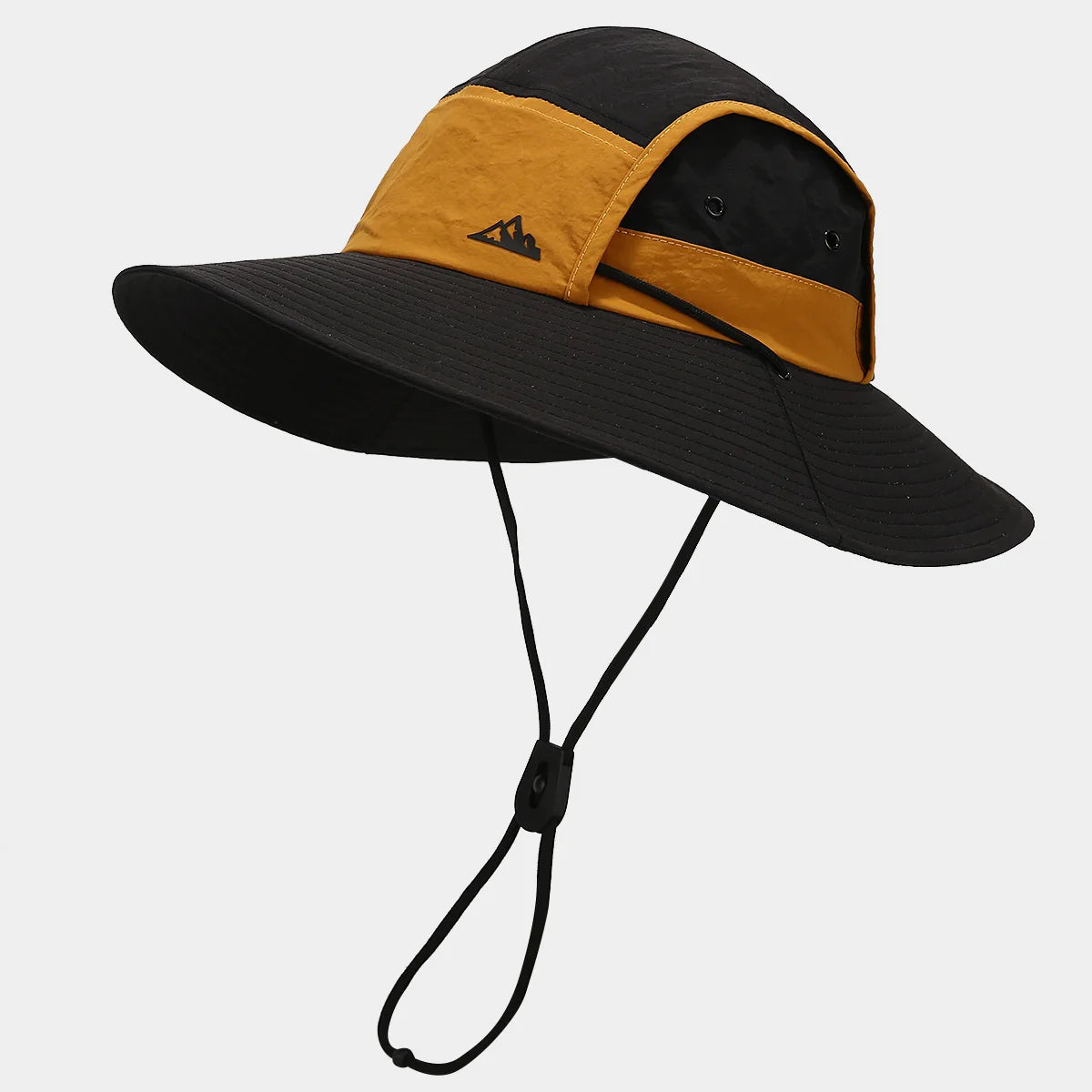 Black and mustard yellow wide-brimmed hat with Adidas logo on a light gray background
