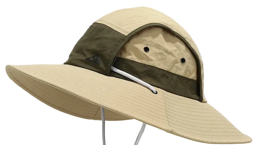 Beige wide-brimmed hat with green band and chin strap on a light gray background
